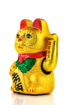 Waving cat,gold-plated welcome cat with waving paw against a white background