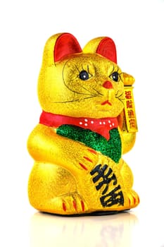 Waving cat,gold-plated welcome cat with waving paw against a white background