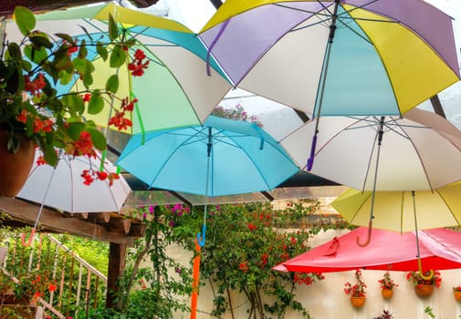 Colorful umbrellas hanging in Villa de Leyva, Colombia