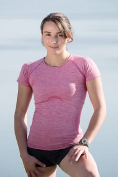 portrait of a young sporty woman in the countryside