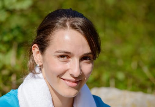 portrait of a young sporty woman in the countryside