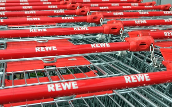 Shopping trolley with REWE company logo