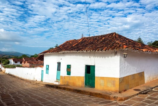 Colonial architecture on a street corner in the historic town of Barichara, Colombia