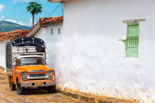 BARICHARA, COLOMBIA - MAY 5: View of an old truck on the street in Barichara, Colombia on May 5, 2016