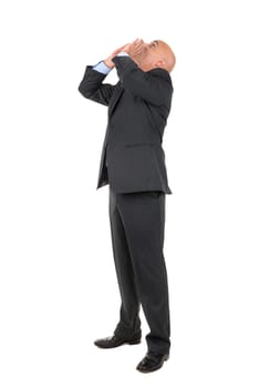Businessman shouting isolated against a white background