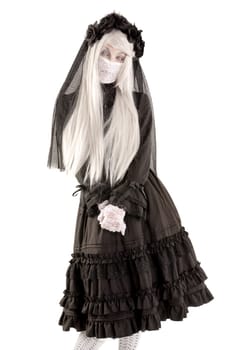 Widow in a black dress with white eyes looking like a doll isolated in white