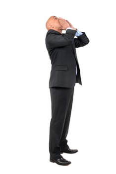 Businessman shouting isolated against a white background