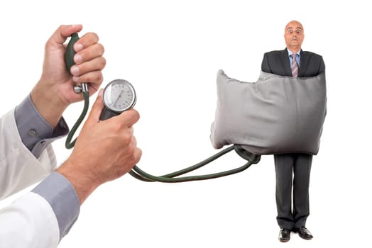Businessman wrapped in a blood pressure measure device isolated in white