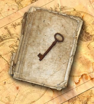 Worn and tattered book and old rusty key on the old maps