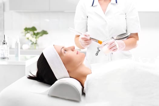 a woman's face during a treatment at a beauty salon\n