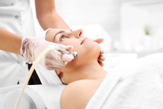 diamond dermabrasion,peeling exfoliation.\ndiamond microdermabrasion,cosmetic scrub\noksydermabrazja\nwoman at the beautician,microdermabrasion treatment\n