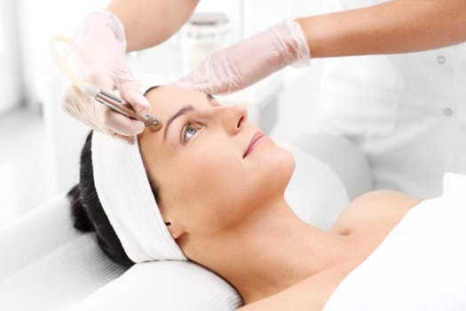 diamond dermabrasion,peeling exfoliation.\ndiamond microdermabrasion,cosmetic scrub\noksydermabrazja\nwoman at the beautician,microdermabrasion treatment\n