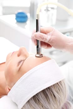diamond dermabrasion,peeling exfoliation.\ndiamond microdermabrasion,cosmetic scrub\noksydermabrazja\nwoman at the beautician,microdermabrasion treatment\n