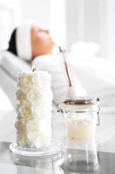woman in a beauty salon.\nwoman at the spa.\na woman relaxing in a beauty salon.\n