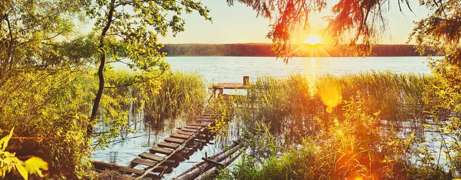 Sunset over the river. Amazing landscape. Panorama