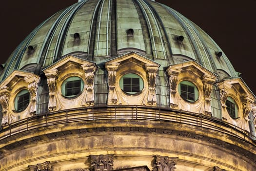 Fragment of old cathedral dome at night