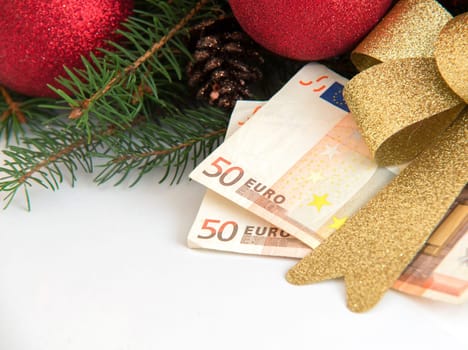 Christmas Gift box with Euro money on white background