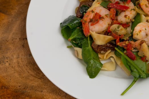 fresh salad of prawns,baby spins and chili,rustic style,top view