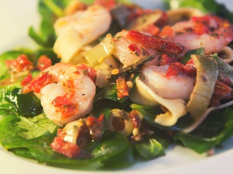 fresh salad of prawns,baby spinach and chili