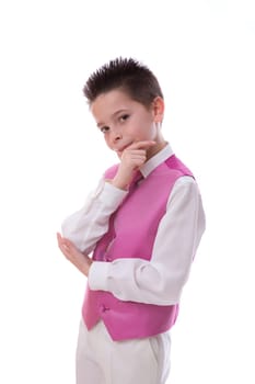 Young boy holding his chin and looking at camera celebrating his First Holy Communion on a white background