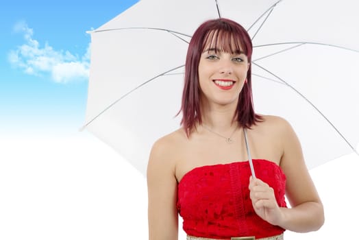 beautiful young woman with an umbrella on blue sky with clouds
