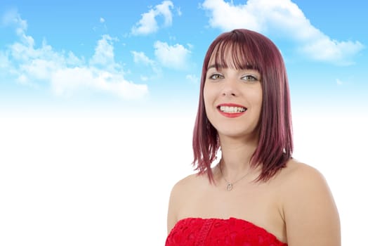 portrait of a beautiful young woman with green eyes in blue sky