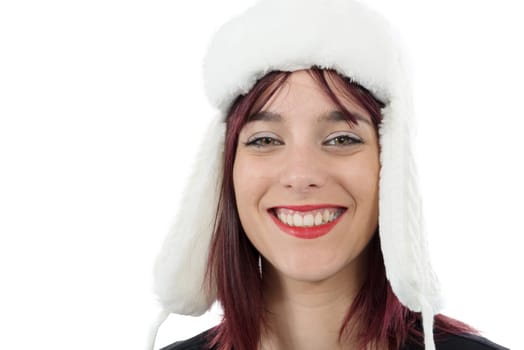 portrait of a beautiful young woman with a winter hat isolated on white background
