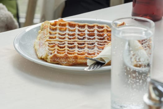 Sweet heart waffles on a white plate. .