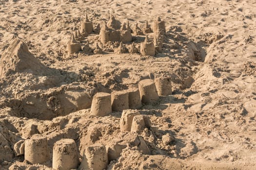 Small sand castle on a beach in Spain..