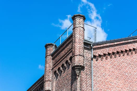 House façade of an old renovated brick house.