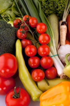 Cherry tomatoes with other fresh vegetables.