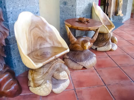 Ubud, Indonesia - December 12, 2012: Carved wooden animal statues in souvenir shop at Ubud, Indonesia