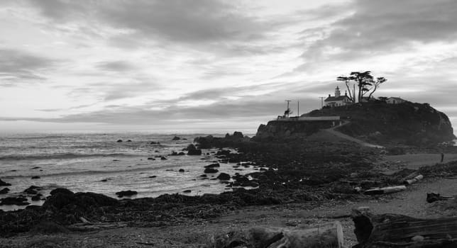 Night falls on a rocky outcropping in Crescent City