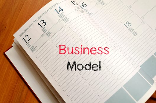 Business model text concept write on notebook