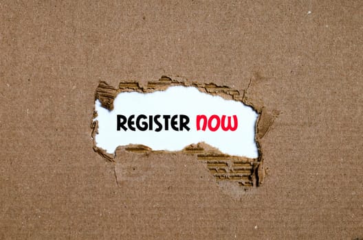 The word register now appearing behind torn paper
