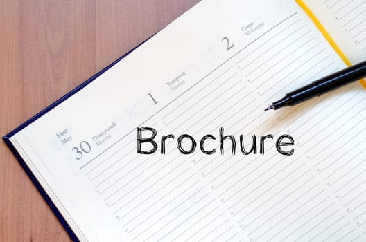 Brochure text concept write on notebook