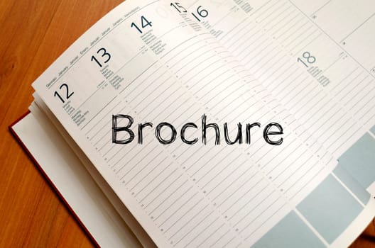 Brochure text concept write on notebook