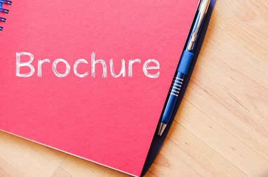 Brochure text concept write on notebook
