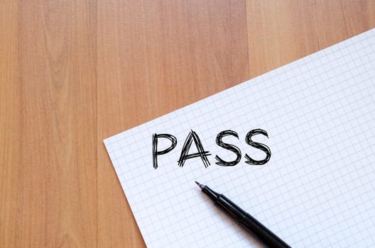 Pass text concept write on notebook