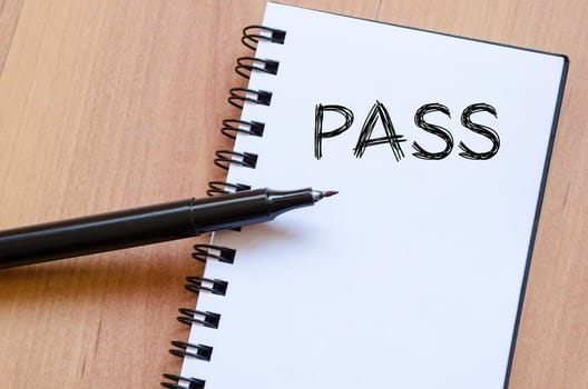 Pass text concept write on notebook