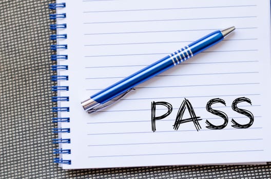 Pass text concept write on notebook