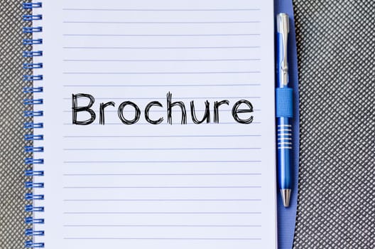 Brochure text concept write on notebook