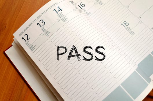 Pass text concept write on notebook