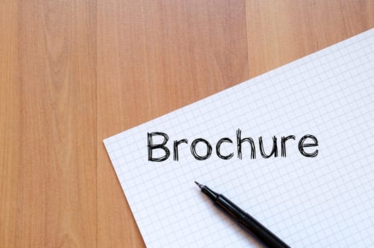 Brochure text concept write on notebook