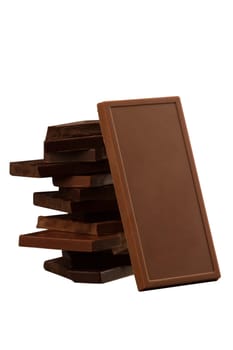 Front view of square shaped chocolate pieces isolated on white background