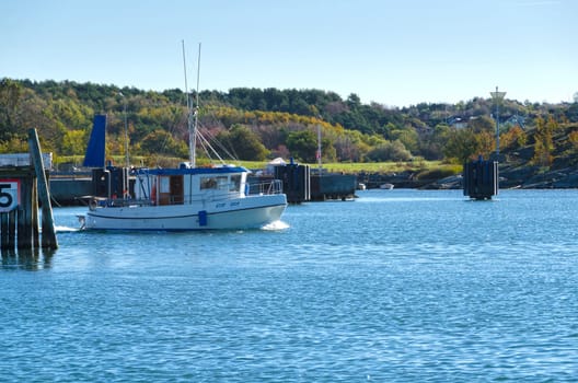 one small fishingboat on the swedish westcoast going out and fish