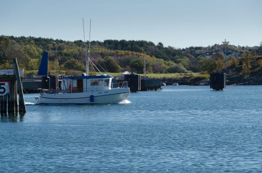 one small fishingboat on the swedish westcoast going out and fish