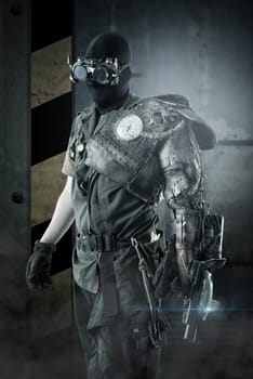 Futuristic soldier posing with gun and armor