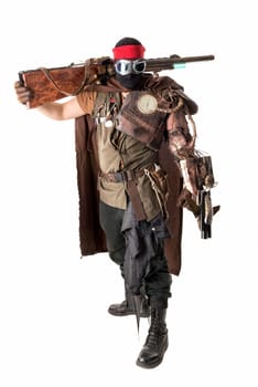Futuristic soldier posing with gun and armor isolated in white