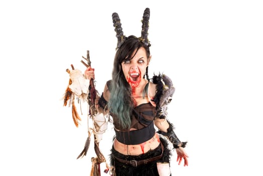 Faun sorceress with big horns and blood isolated in white